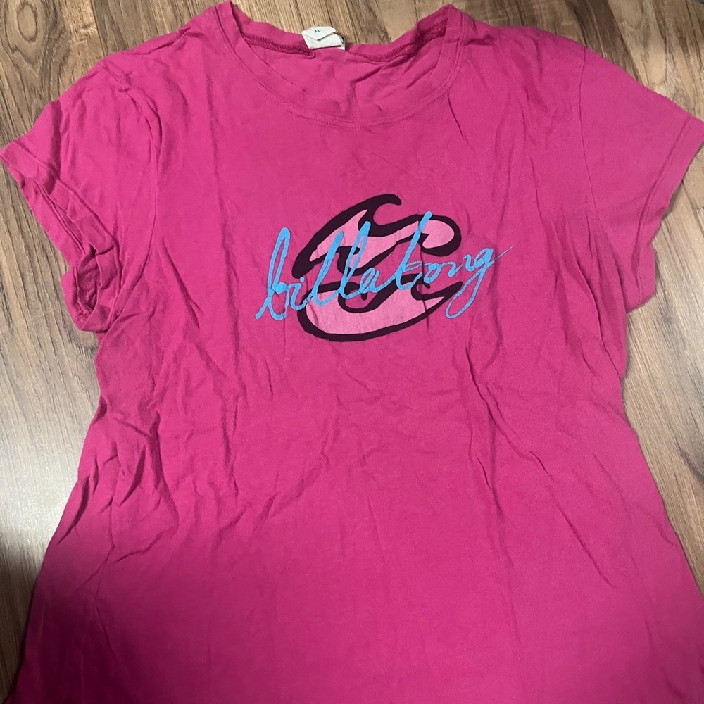 a pink billabong shirt